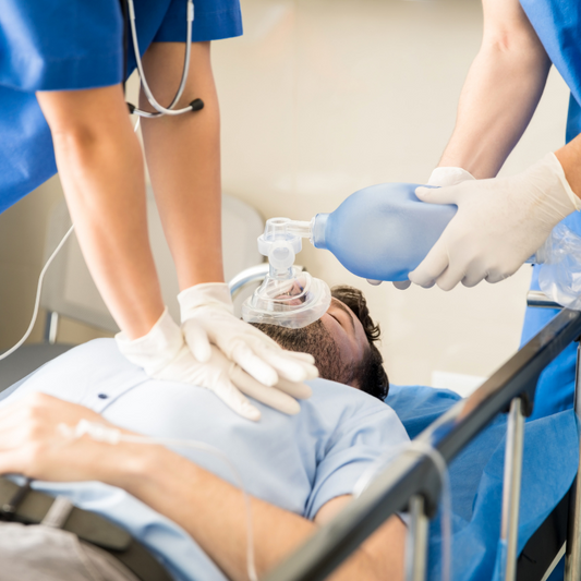 Advanced first aid resuscitation training with CPR and oxygen administration.
